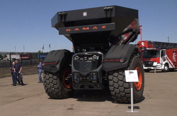 KAMAZ introduced an unmanned dump truck.  He does not have a cab, but the operator is watching him