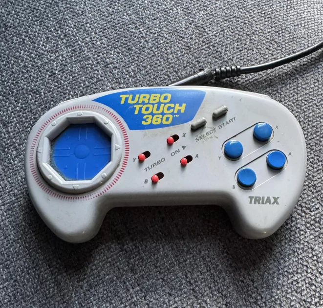 Triax Turbo Touch — «сенсорный» геймпад задолго до Steam Controller