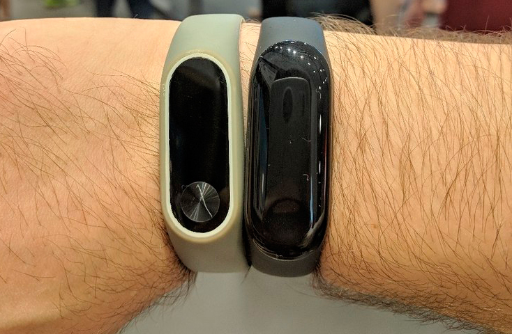 Чем отличаются браслеты. Xiaomi mi Band 2 3. Mi Band 2 и 3. Ми бэнд 2 и ми бэнд 3. Ми бэнд 2 на руке.